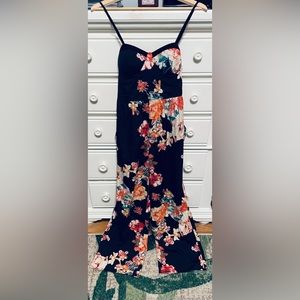 Small- Black floral pant suit with pockets.
